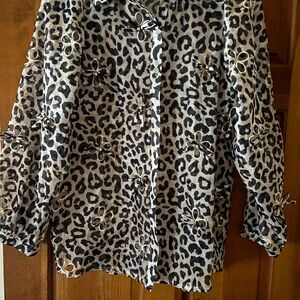 Long sleeve sheer shirt. Leopard balloon sleeve shirt w/Rosette cut outs